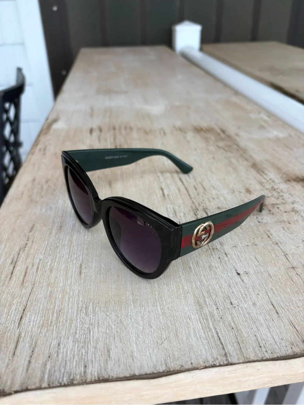 Gucci Black Sunglasses with Green-Red Striped Temples and Gold Logo